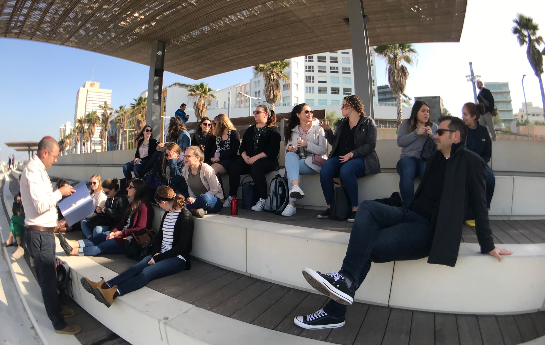 Students sitting together outside